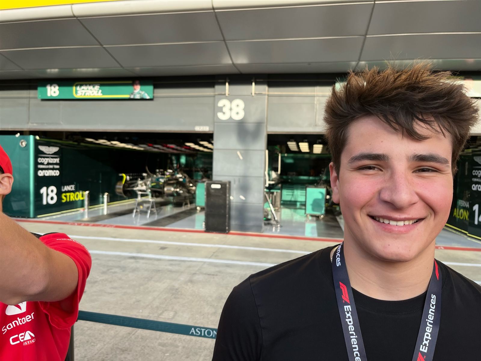 Ben on the pit lane walk in front of the Aston Martin garages at Silverstone